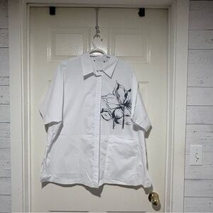 White womens oversized Short-Sleeve Button-Up Shirt purchased at Zack’s.